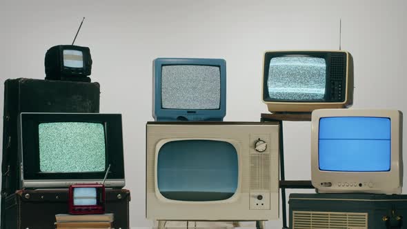 Old Televisions with Grey Interference Screen on Light Background alt
