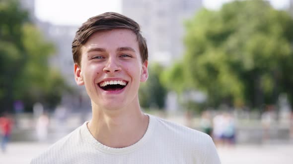 Man Feeling Happy and Laughing at Camera alt