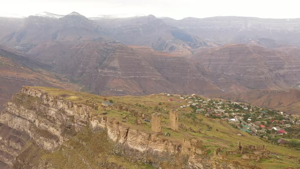 Ancient Towers and Ruins of the Abandoned Village on a Cliff alt