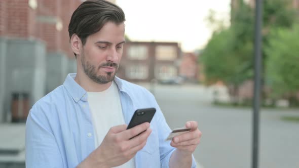 Man Having Online Payment Success on Smartphone alt