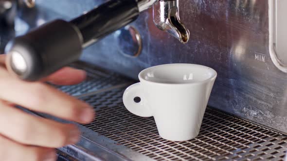 Espresso machine preparing a cup of espresso coffee