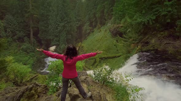 Asian Woman Enjoying Nature alt