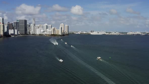 View at Miami's Embankment and Sailing Boats on Blue Sky Background