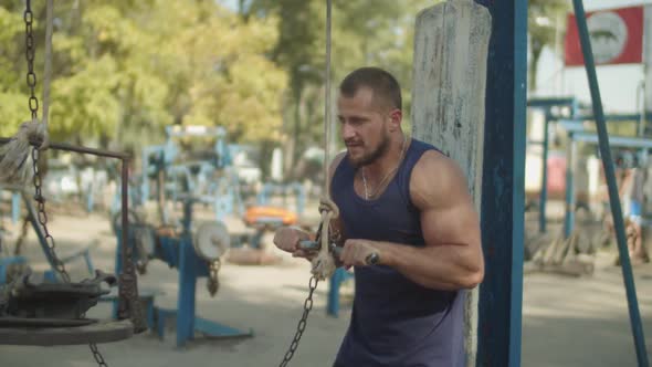 Athlete Training Triceps Pushdown Exercise Outdoor alt