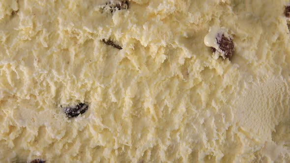 Top View Of Vanilla Flavour Ice Cream With Raisins In Box