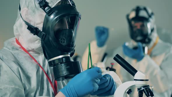 Professional Virologists Work with Coronavirus Antibodies To Develop a Vaccine. alt