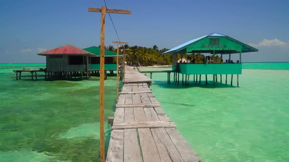 Tropical Island with a Beach on the Atoll alt