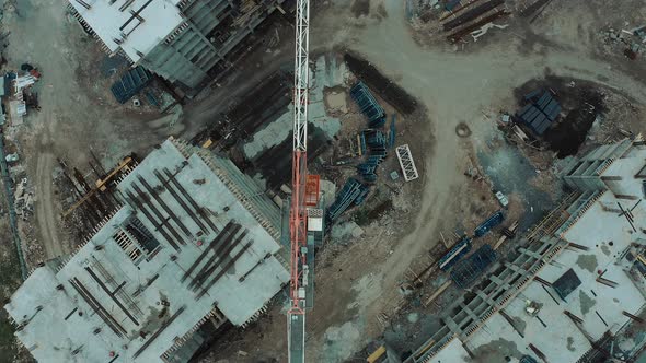 Construction Crane on a Construction site - Aerial footage