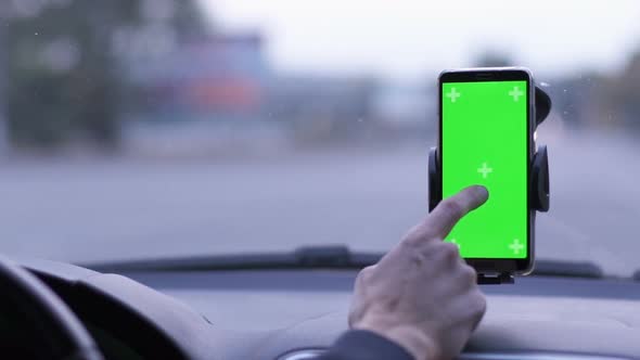 Phone on Car Dashboard Green Screen