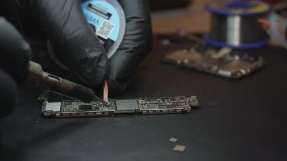 Master Soldering a Board for a Smartphone