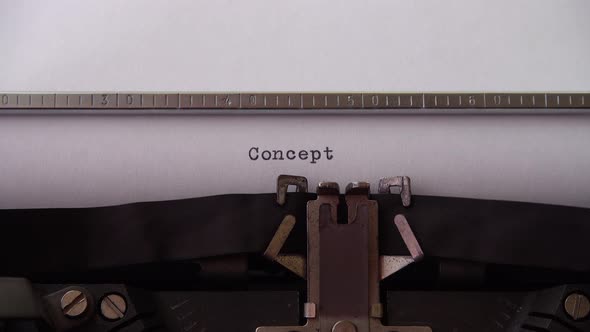 Typing word Concept on retro typewriter. Close up. alt