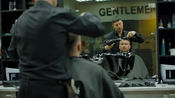 Barber Styling Hair of Male Client alt