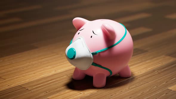 Piggy bank in a protective mask. Health and financial issues while the epidemic. alt
