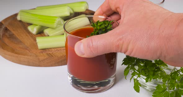 Glasses of Tomato Juice on the Table alt