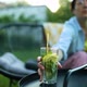 Happy Woman in Glasses Sitting on Chair at Backyard Outdoor at Home Take Lemonade - VideoHive Item for Sale