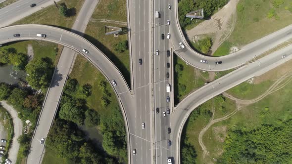 Top down aerial view of Road junction with car traffic in a city. 07 alt