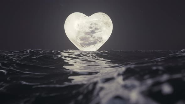 Heart-shaped moon over the sea