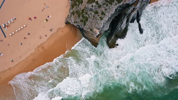 Aerial Bird Eye View of Surreal Praia Da Adraga Beach in Sintra Portugal