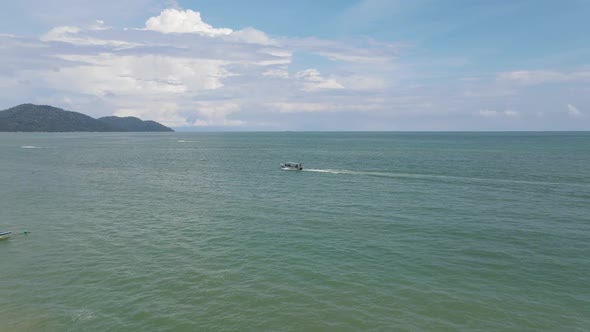 Aerial view of water sport activities, sea and hills in Penang