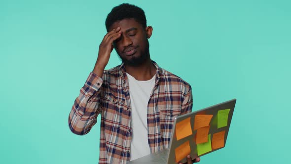 Exhausted Man Freelancer with Pasted Sticker Notes Using Laptop Computer Concentration Problem alt