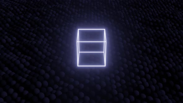Neon glowing cube in a black space with moving field. Seamless loop simple 3d animation with neon alt