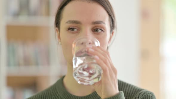 Portrait of Young Woman Drinking Water, Glass alt