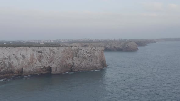 Sensational Aerial Drone View of Portugal Beauty Rocky Cliff Coast in Lagos Algarve Circle Pan alt