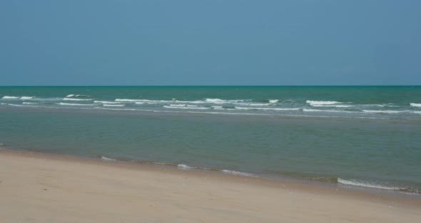 Water wave on sand beach