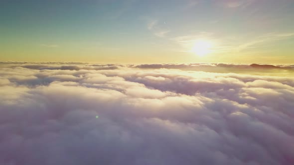 Drone Flies in the Clouds alt