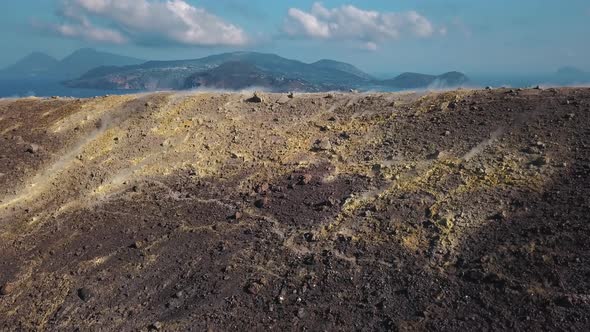 Aerial View on Volcanic Gas Exiting Through Fumaroles. Steaming Volcano Surface. Vulcano, Lipari alt