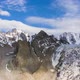 Tian Shan Mountains and Blue Sky with Clouds. Aerial View - VideoHive Item for Sale