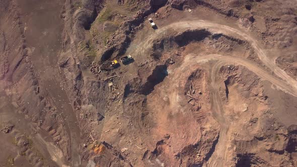 Aerial View of Working Excavator in the Opencast Mine alt