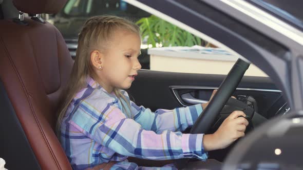 A Nice Girl Is Trying To Start a Car