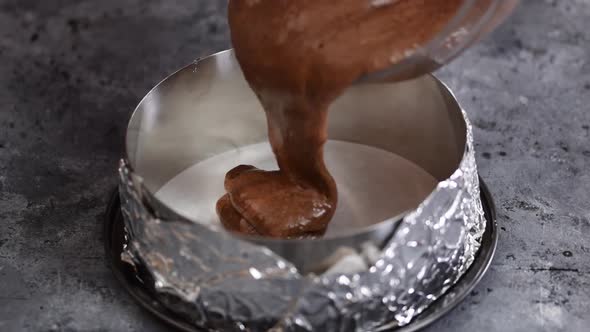 Pouring Cake Dough in a Mold