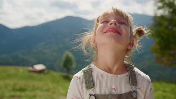 Portrait Little Girl Looking at Sky Standing Meadow alt