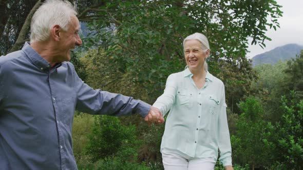 Senior couple in a garden alt