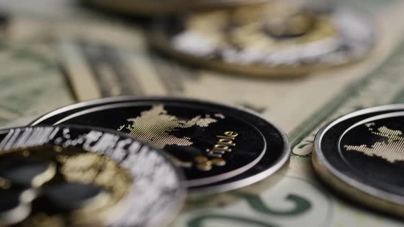 Rotating shot of Bitcoins (digital cryptocurrency) - Ripple alt