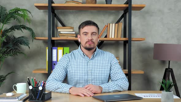 Tired teacher coach massaging neck in pain after long time hard work at laptop alt