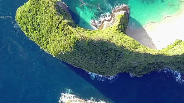 Flight over the Rocks of the Tropical Shore