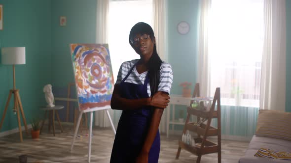 Confident Black Woman Artist Posing On Camera alt