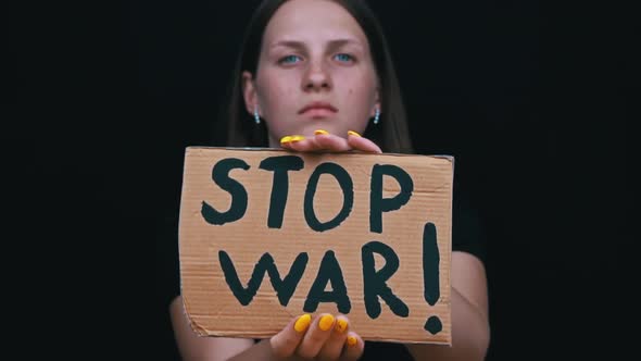 Upset Ukrainian Poor Girl Protesting Against the Military Conflict alt