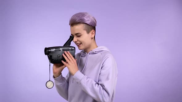 Generation Z Person Using Old VHS Camcorder Shooting Video Isolated alt