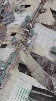 Vertical Video of a Wardamaged Apartment Building in Ukraine alt