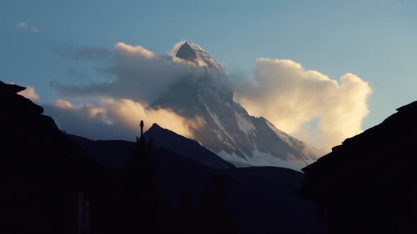 Timelapse of the Matterhorn mountain from Zermatt Village during sunset alt