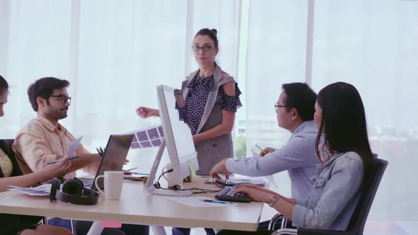 Senior Leader Giving Advice Speech to Team Members alt