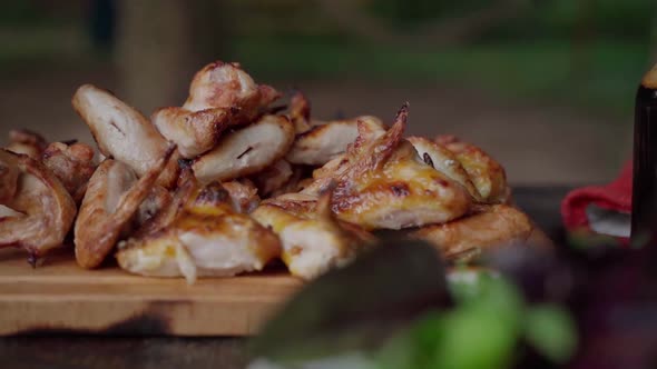 Freshly Cooked Smoked Chicken Wings on Wooden Platter