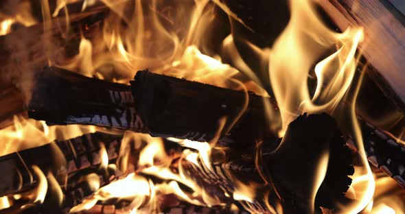 Closeup View on Burning Wood in a Fireplace the Home alt