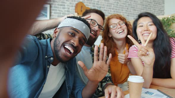 Smiling Office Workers Multi-racial Team Taking Selfie at Work Posing for Camera alt