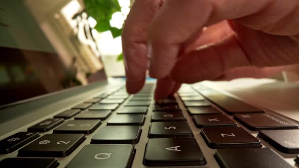 Someone's Fingers Pressing Buttons on Laptop. Typing and Entering Log in and Password Information To alt