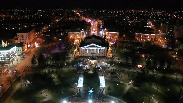 New Year's lighting in the city square. Aerial view.